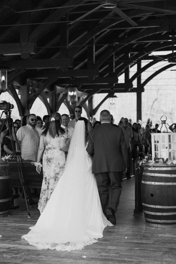 cute picture of the bride walking down the aisle