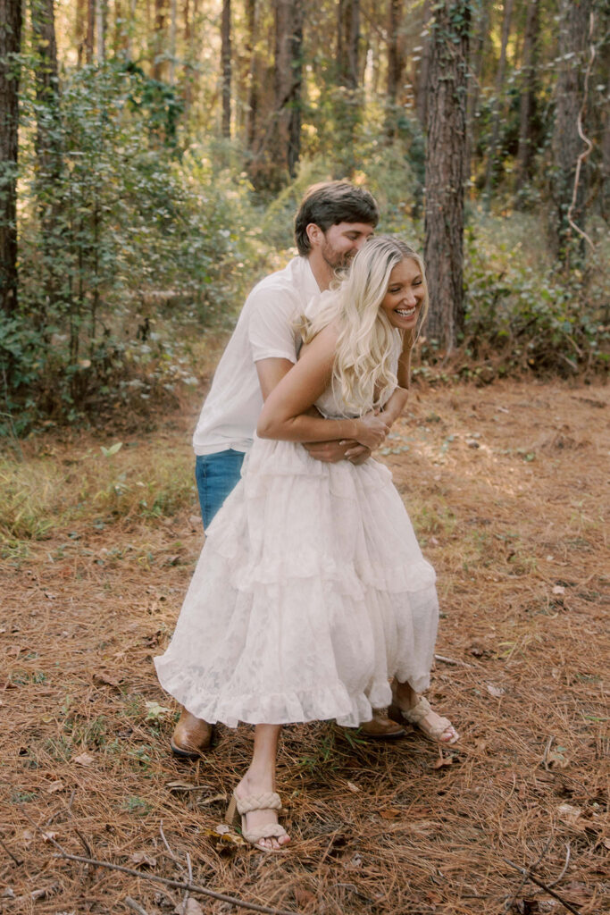 Couple hugging during their playful photo shoot