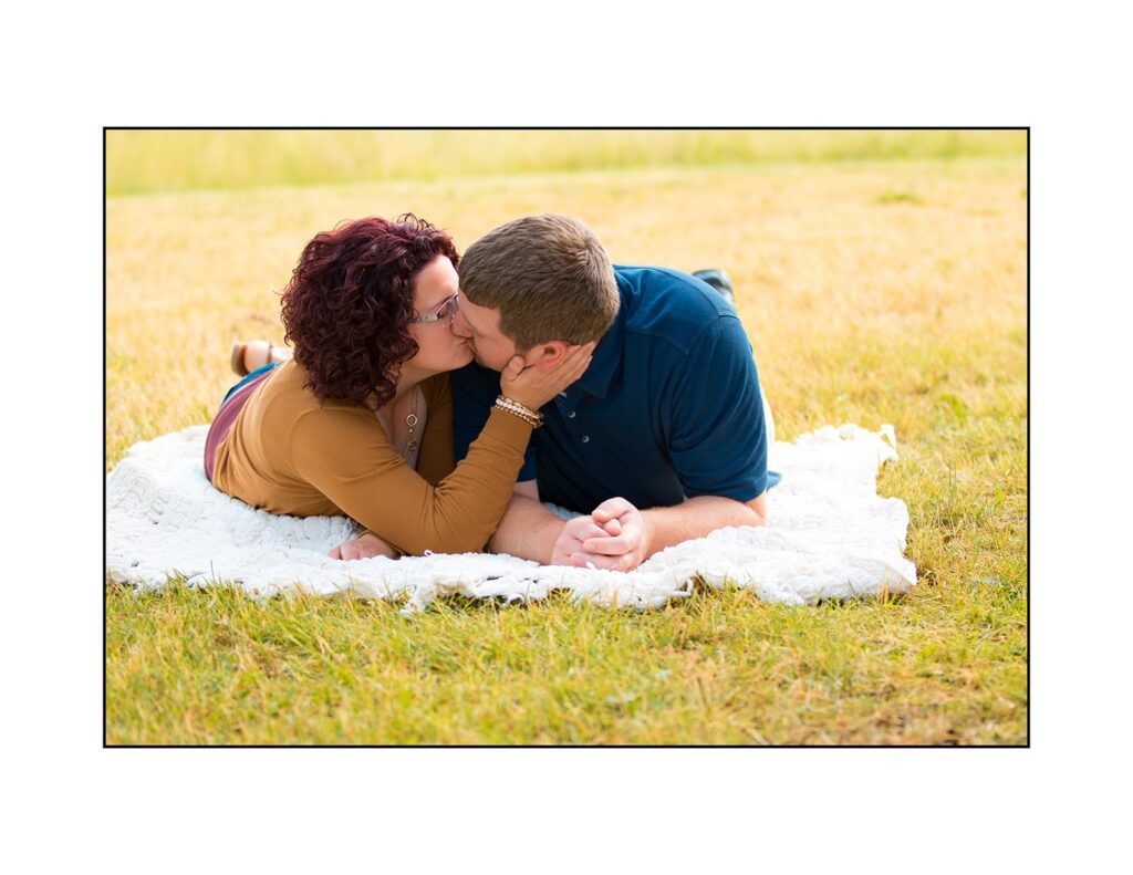 Couple kissing during their photo shoot