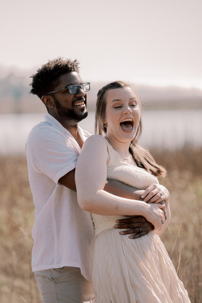 couple laughing with each other during their photoshoot