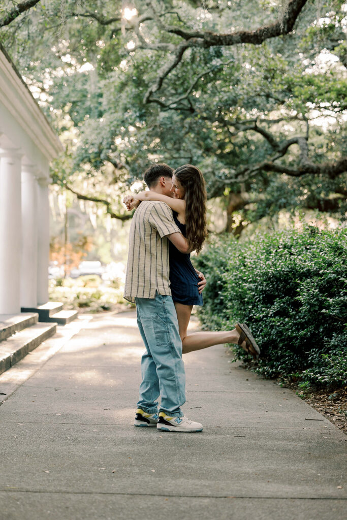 Portrait of the newly engaged, couple kissing
