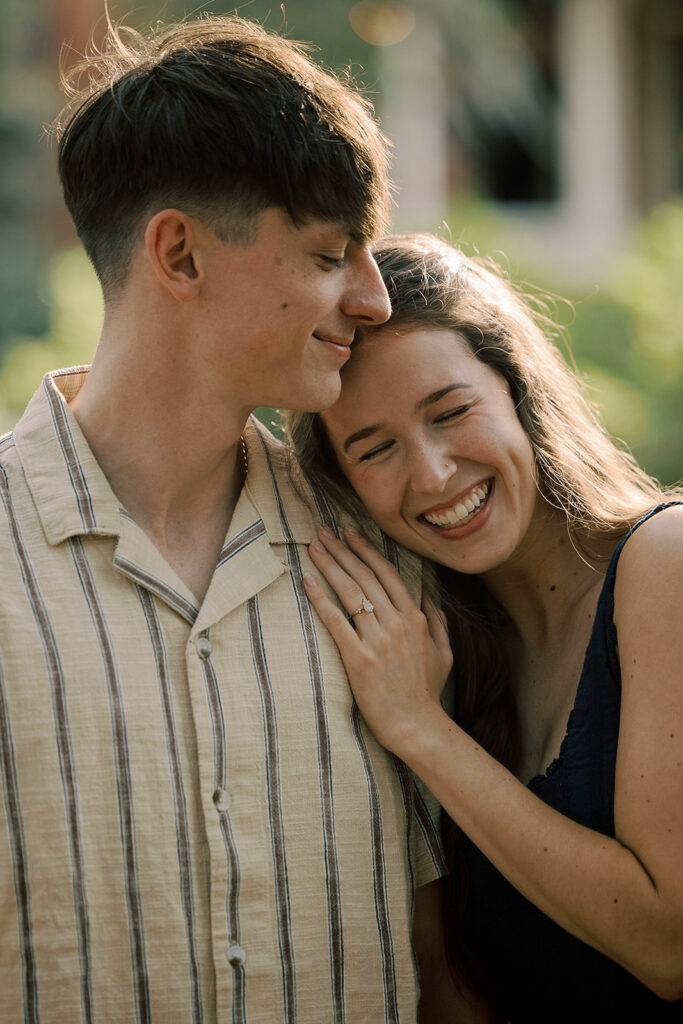 cute picture of the newly engaged couple hugging