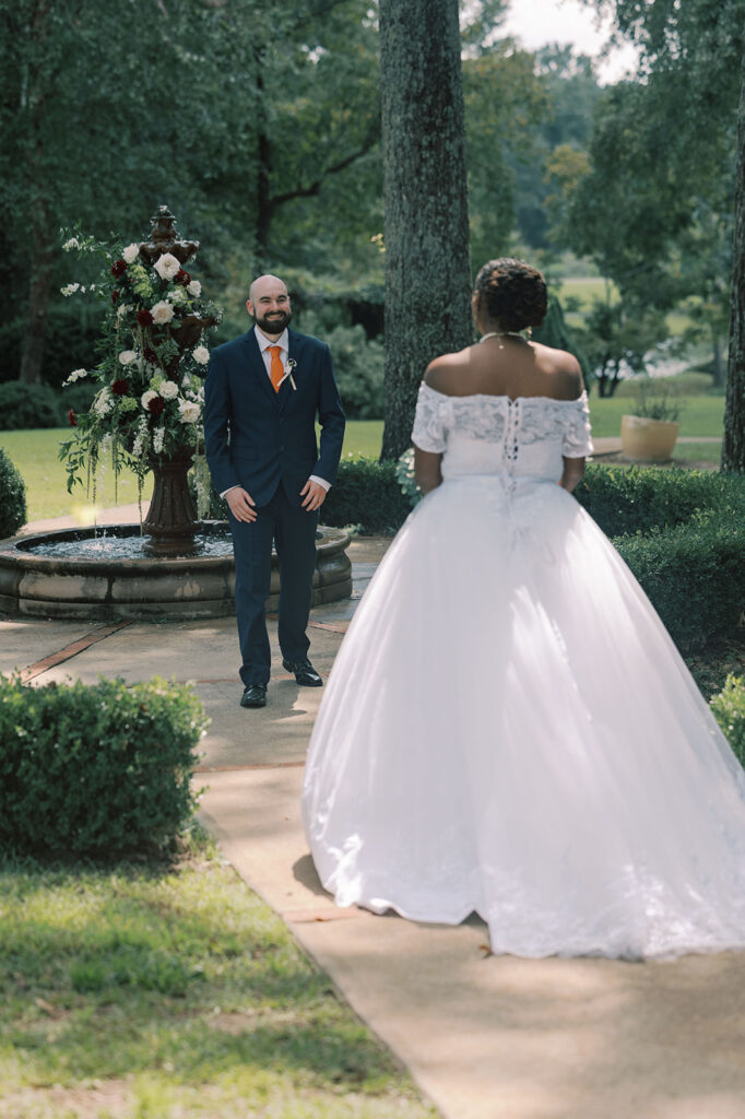 cute picture of the bride and groom at their first look