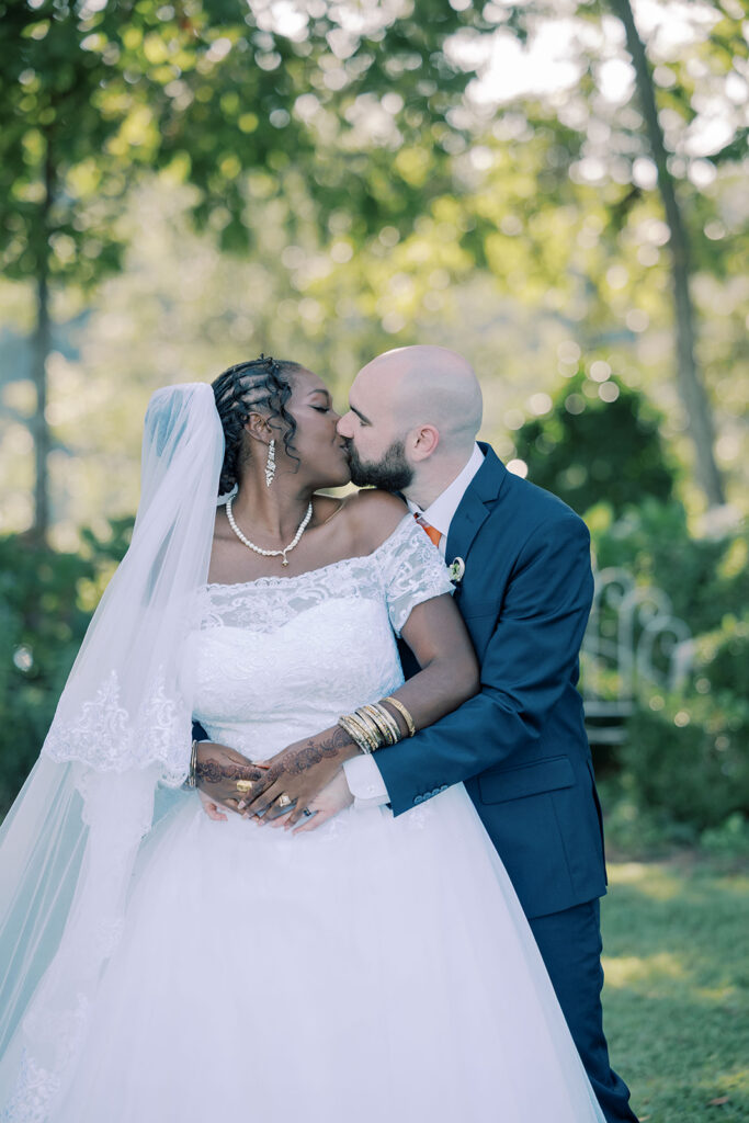 cute picture of the newlyweds kissing