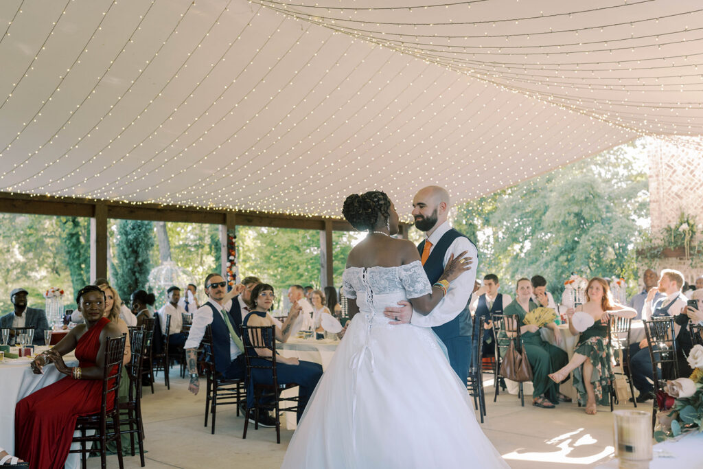 cute picture of the newlyweds smiling at each other