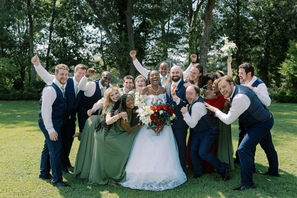 Picture of the bride and groom with their bridal parties