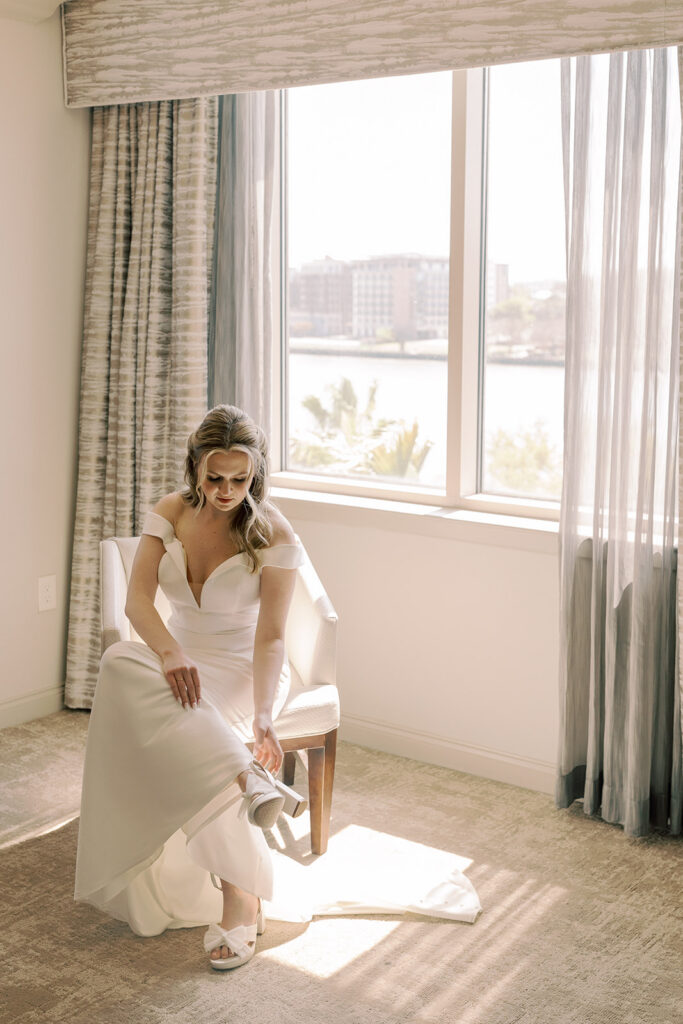 cute picture of the bride getting ready for her dream wedding day