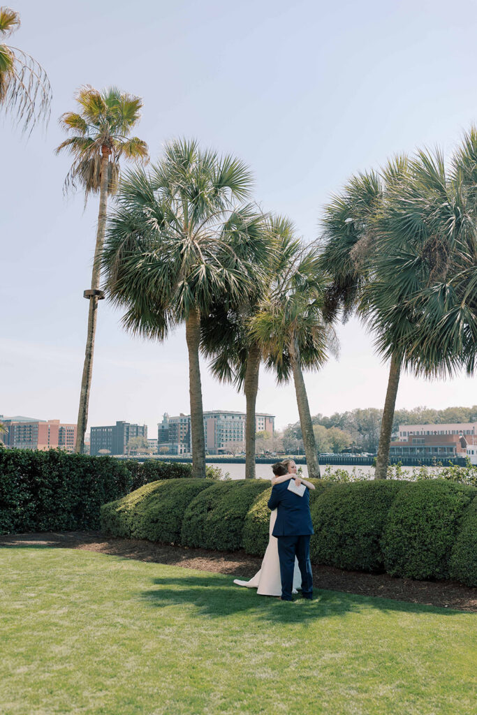 cute picture of the bride and groom hugging